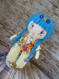 Lollipop Girl, White, Blue Braids, Orange/Purple/Yellow Floral Top/Light Yellow Pants
